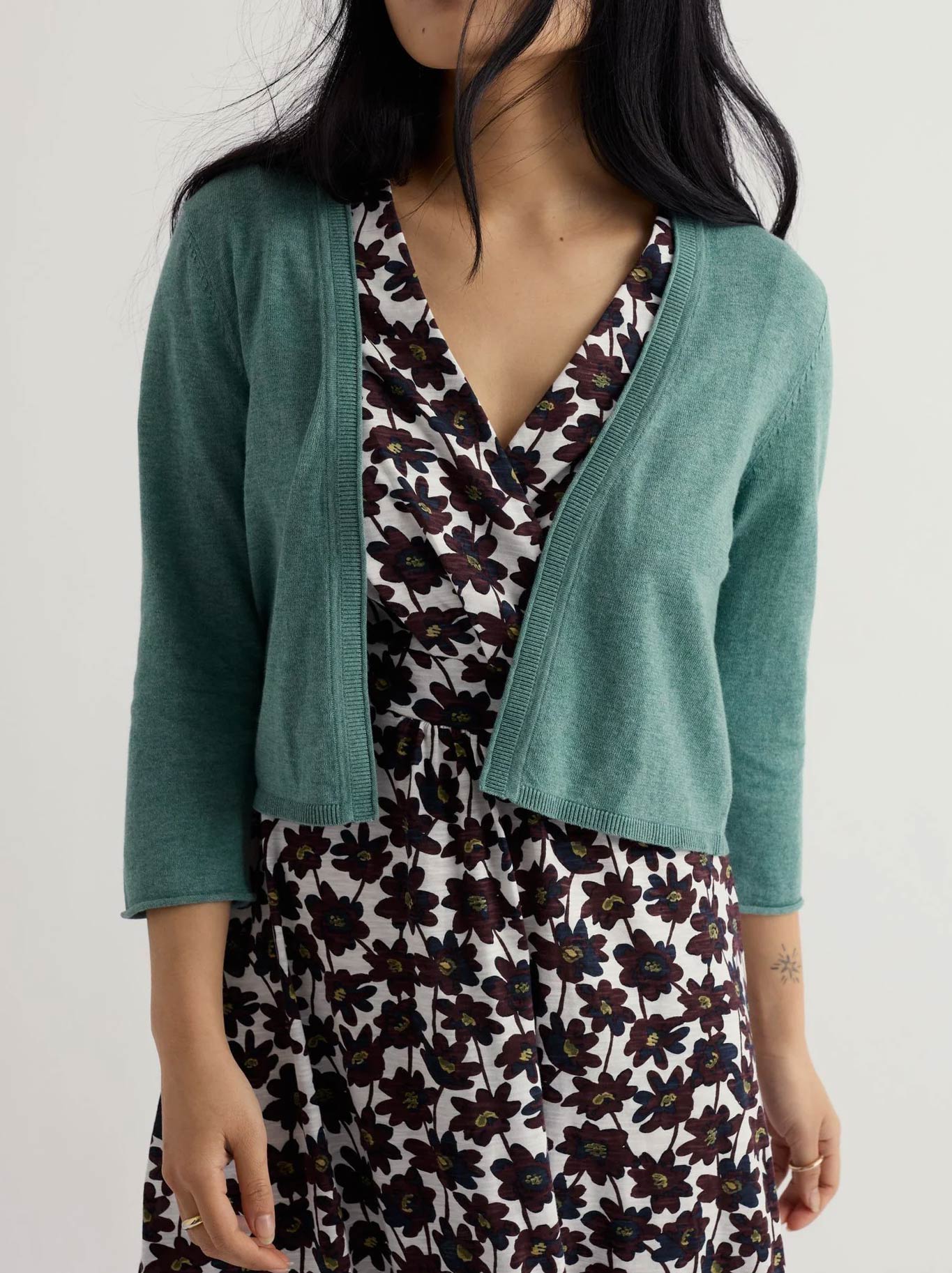 Image of a model wearing Outerwear. Product name - Seasalt Vanessa Cardigan in Sardine colour by brand - Seasalt