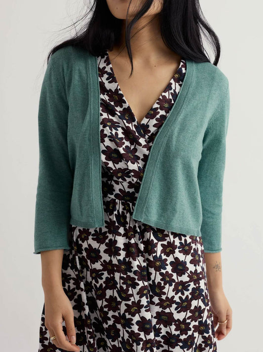 Image of a model wearing Outerwear. Product name - Seasalt Vanessa Cardigan in Sardine colour by brand - Seasalt