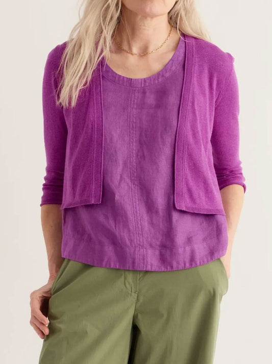 Image of a model wearing Outerwear. Product name - Seasalt Vanessa Cardigan in Wild Orchid colour by brand - Seasalt