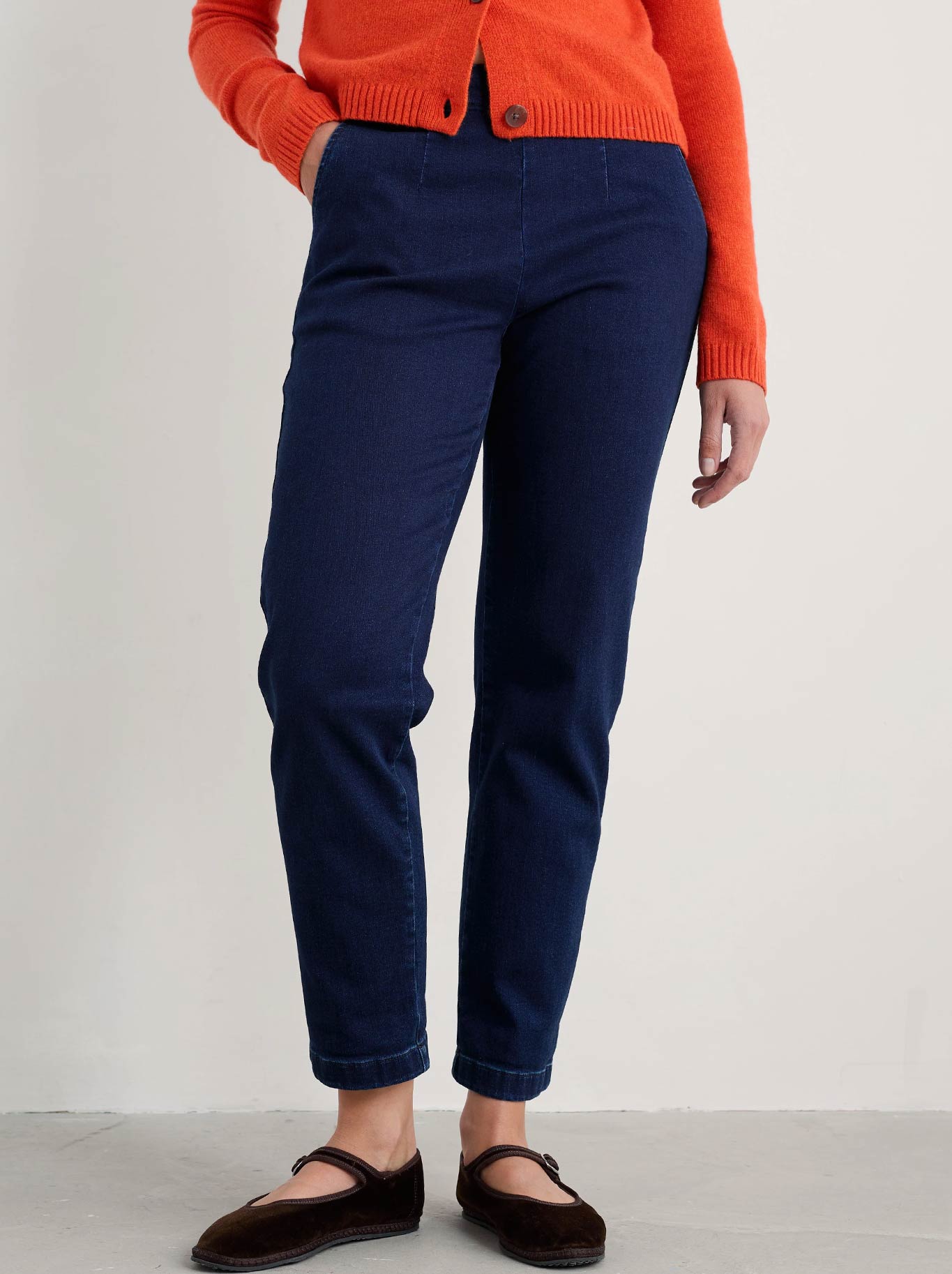 Image of a model wearing Pants. Product name - Seasalt Waterdance Trouser in Dark Indigo colour by brand - Seasalt