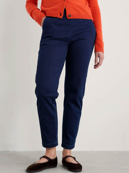 Image of a model wearing Pants. Product name - Seasalt Waterdance Trouser in Dark Indigo colour by brand - Seasalt