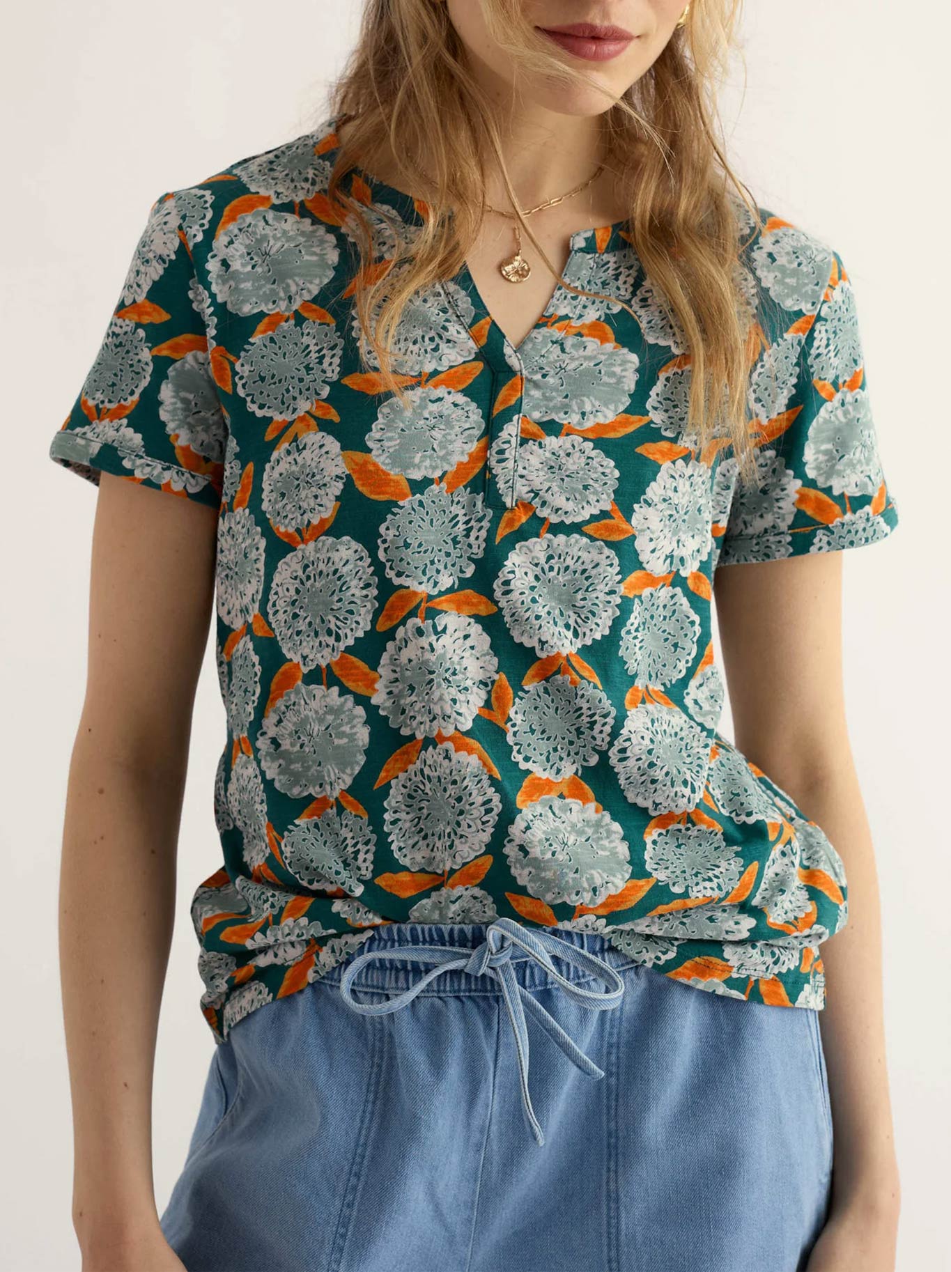 Image of a model wearing Tops. Product name - Seasalt Waterflow Top in Marigold Dark Wreckage colour by brand - Seasalt