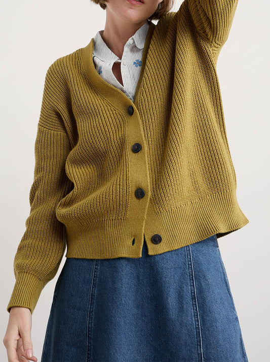Image of a model wearing Outerwear. Product name - Seasalt Winding Creek Cardigan in Pear colour by brand - Seasalt