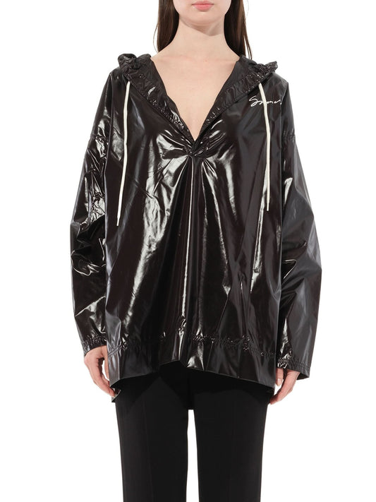 Image of a model wearing Tops. Productname: GIVENCHY Shining Long Sleeve Shirt in Black colour by brand - GIVENCHY