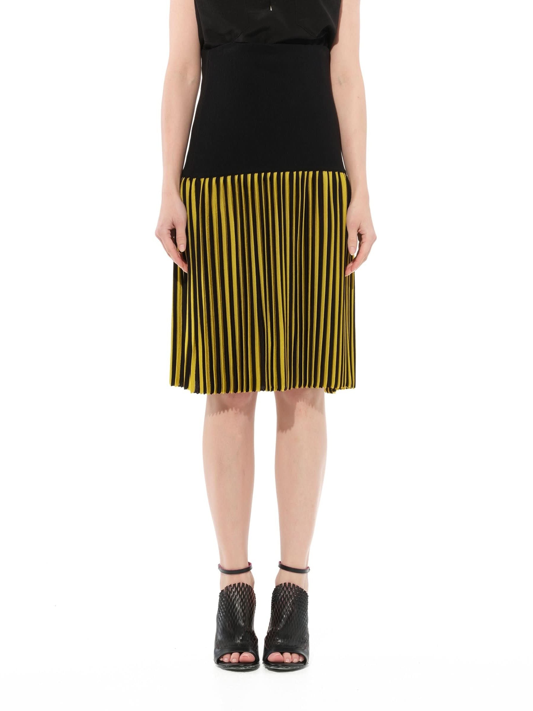 Image of a model wearing Skirts. Product name - Short Skirt in Black colour by brand - GIVENCHY