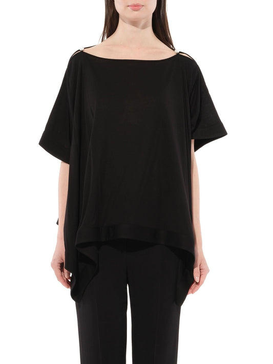 Image of a model wearing Shorts. Productname: GIVENCHY Short Sleeve Tops in Black colour by brand - GIVENCHY