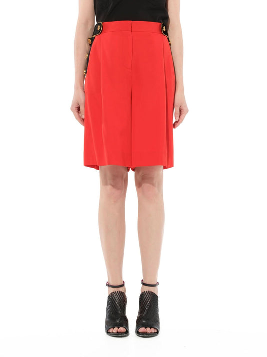 Image of a model wearing Shorts. Productname: GIVENCHY Shorts in Red colour by brand - GIVENCHY