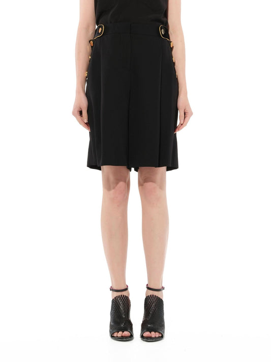 Image of a model wearing Shorts. Productname: GIVENCHY Shorts in Black colour by brand - GIVENCHY