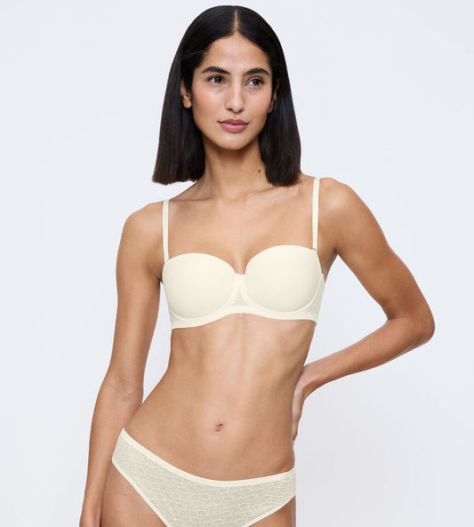 Image of Bras. Productname: Triumph Signature Sheer Strapless Wired Padded Bra in White colour by brand - Triumph