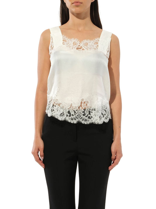 Image of a model wearing Tops. Productname: GIVENCHY Sleeveless Tops in White colour by brand - GIVENCHY