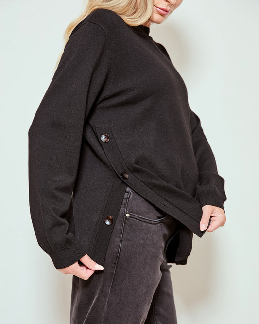 Image of a model wearing Outerwear. Product name - Soft Knit Feeding Top in colour by brand - Soon Maternity