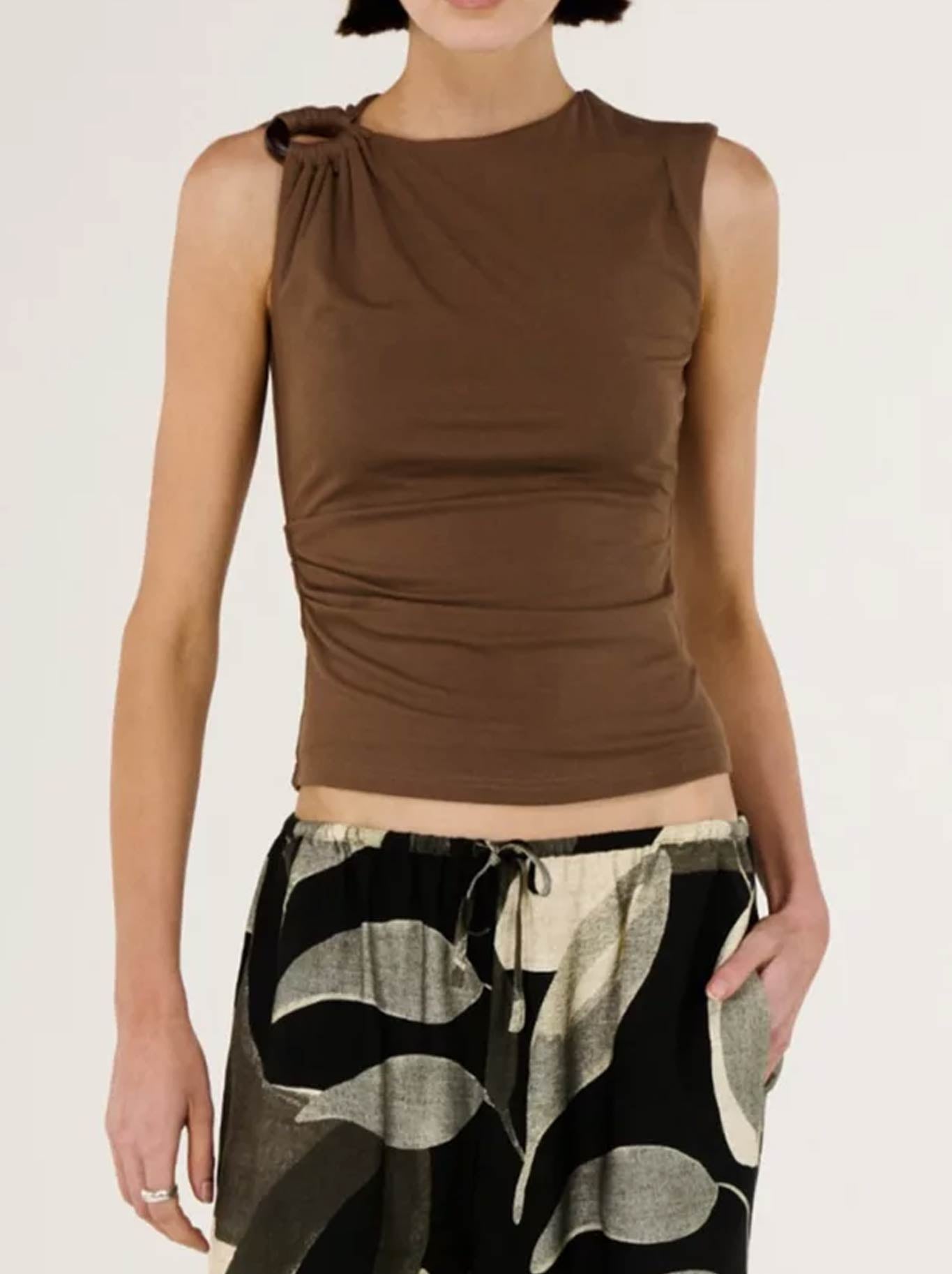 Image of a model wearing Tops. Productname: STAPLE THE LABEL BLAIR HARDWARE TOP in Chocolate colour by brand - Staple