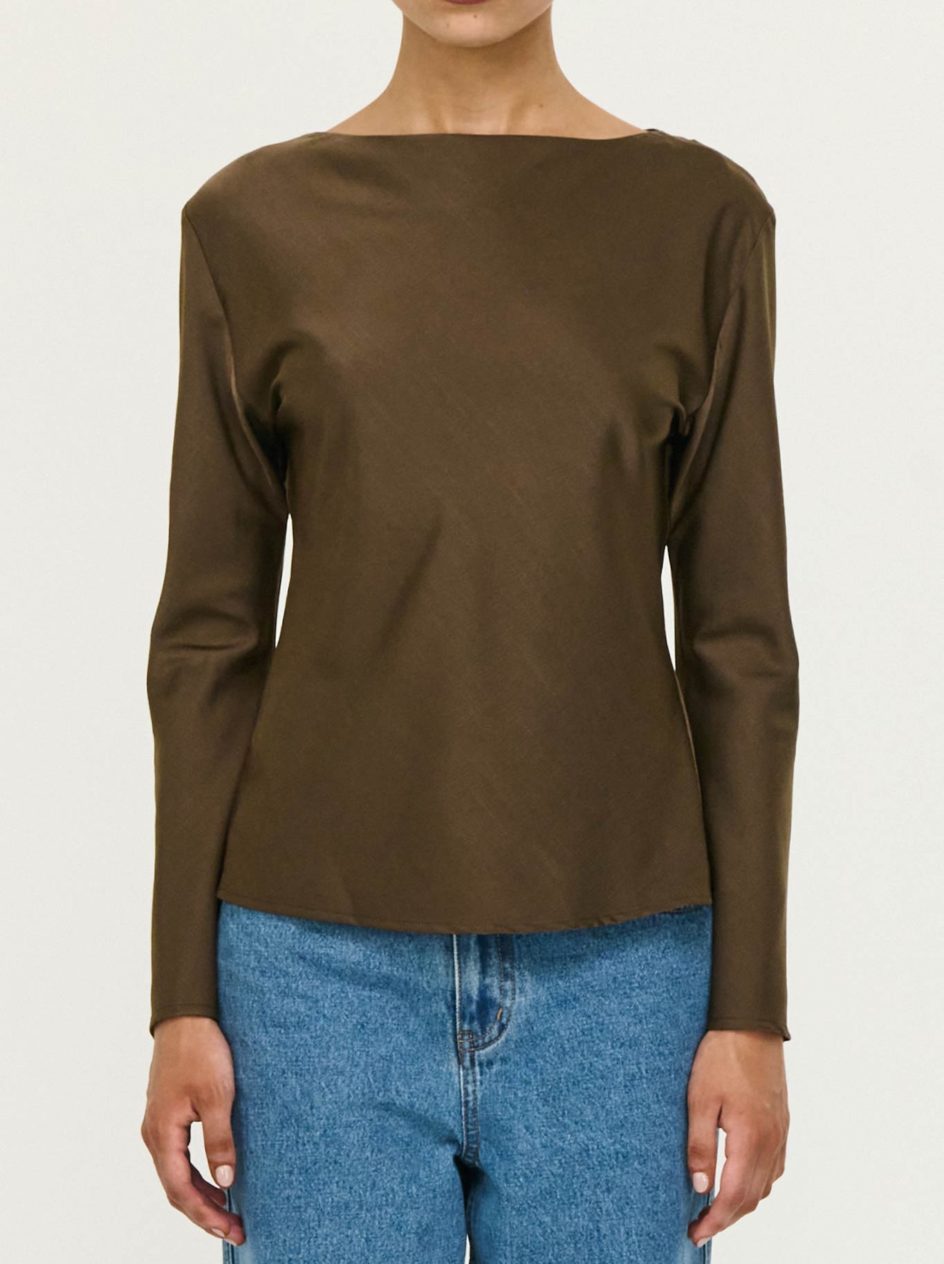 Image of a model wearing Tops. Product name - Staple The Label Dakota Bias Top in Espresso colour by brand - Staple