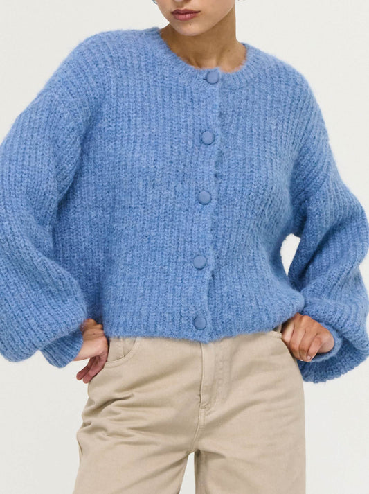 Image of a model wearing Outerwear. Product name - Staple The Label Elowen Cardigan in Steele Blue colour by brand - Staple