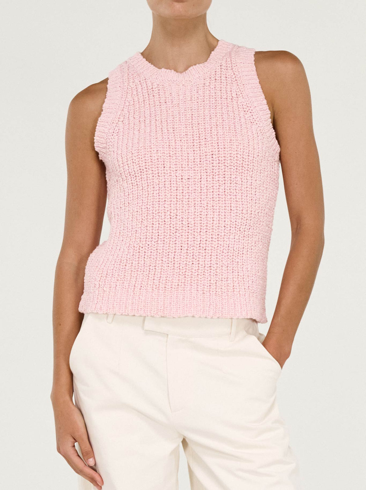 Image of a model wearing Outerwear. Product name - Staple The Label Cove Knit Tank in Rose/Pink colour by brand - Staple