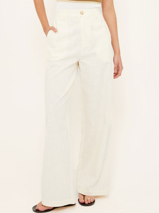 Image of a model wearing Pants. Productname: STAPLE THE LABEL VERA WIDE LEG PANTS in Vanilla colour by brand - Staple