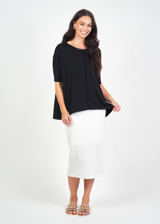 Image of a model wearing Tops. Product name - The Exposed Seam Set in Default Title colour by brand - Lou Lou