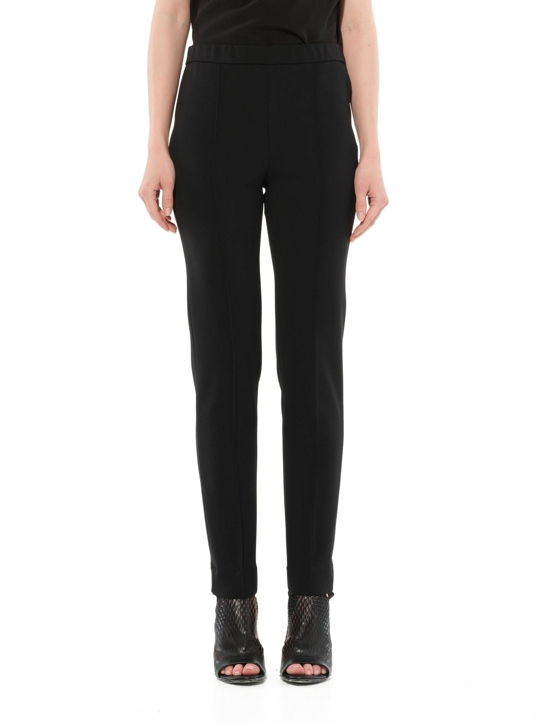 Image of a model wearing Pants. Productname: GIVENCHY Stirrup Pants in Black colour by brand - GIVENCHY