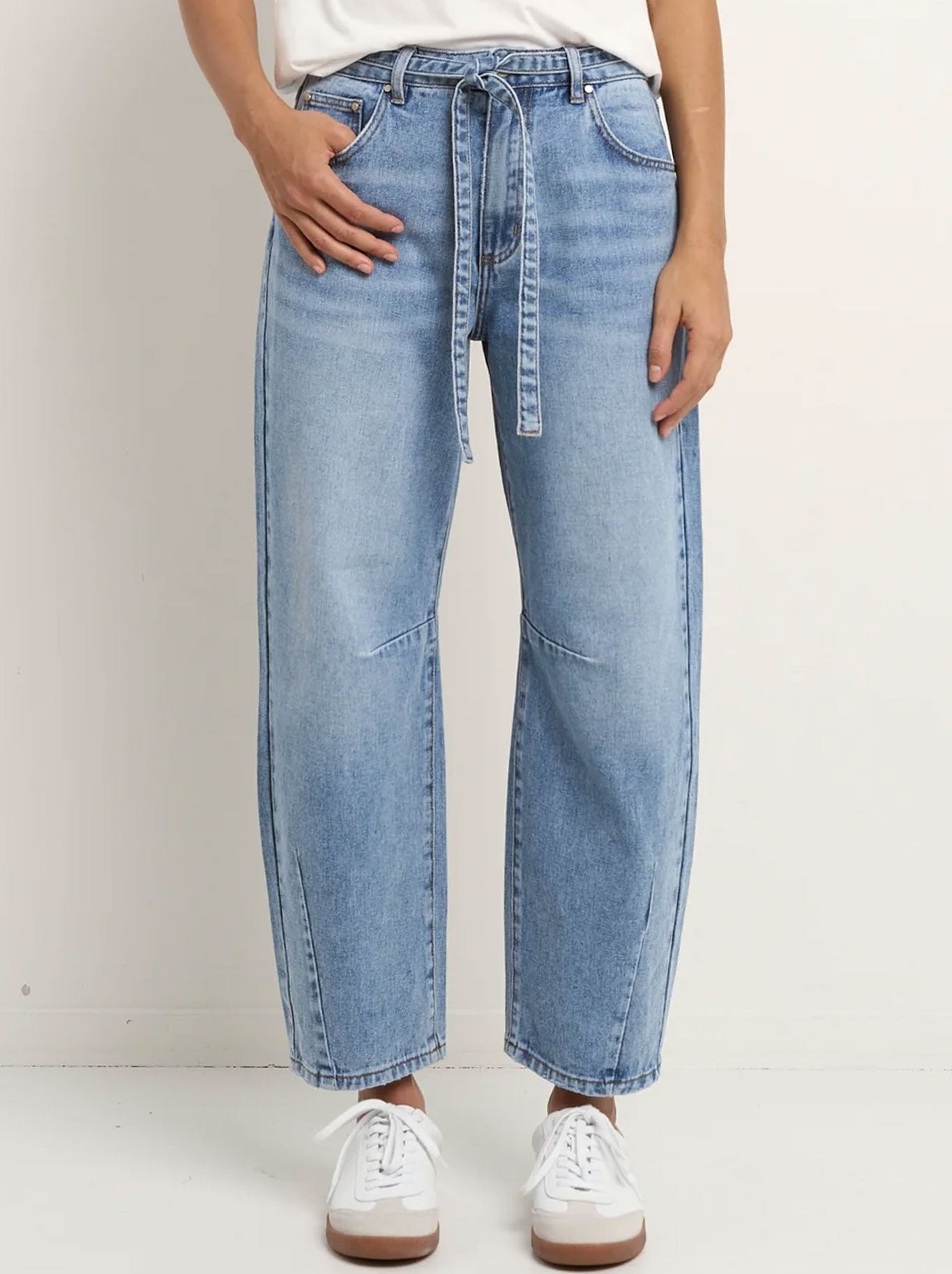 Image of Jeans. Productname: STORIES BE TOLD CAMPUS TIE WAIST BARREL JEAN in Light Blue colour by brand - Stories Be Told