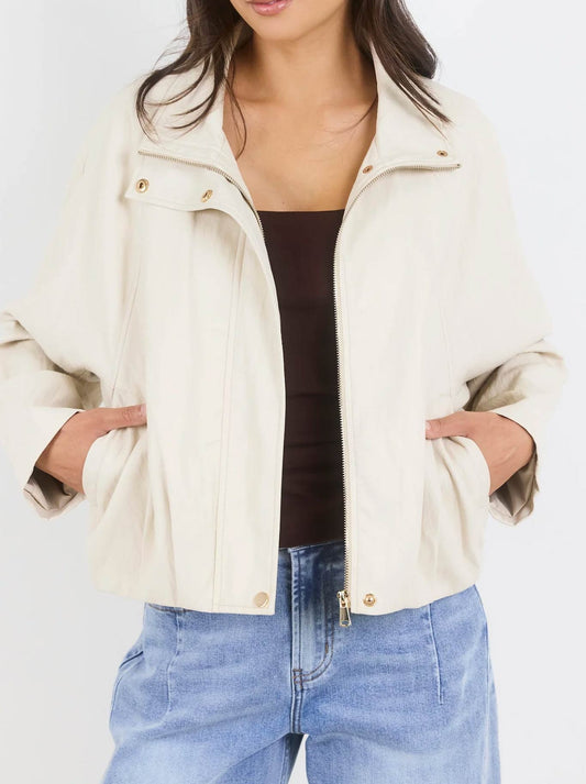 Image of Coats & Jackets. Product name - Stories Be Told Ensemble Faux Leather Zip Bomber in Putty colour by brand - Stories Be Told