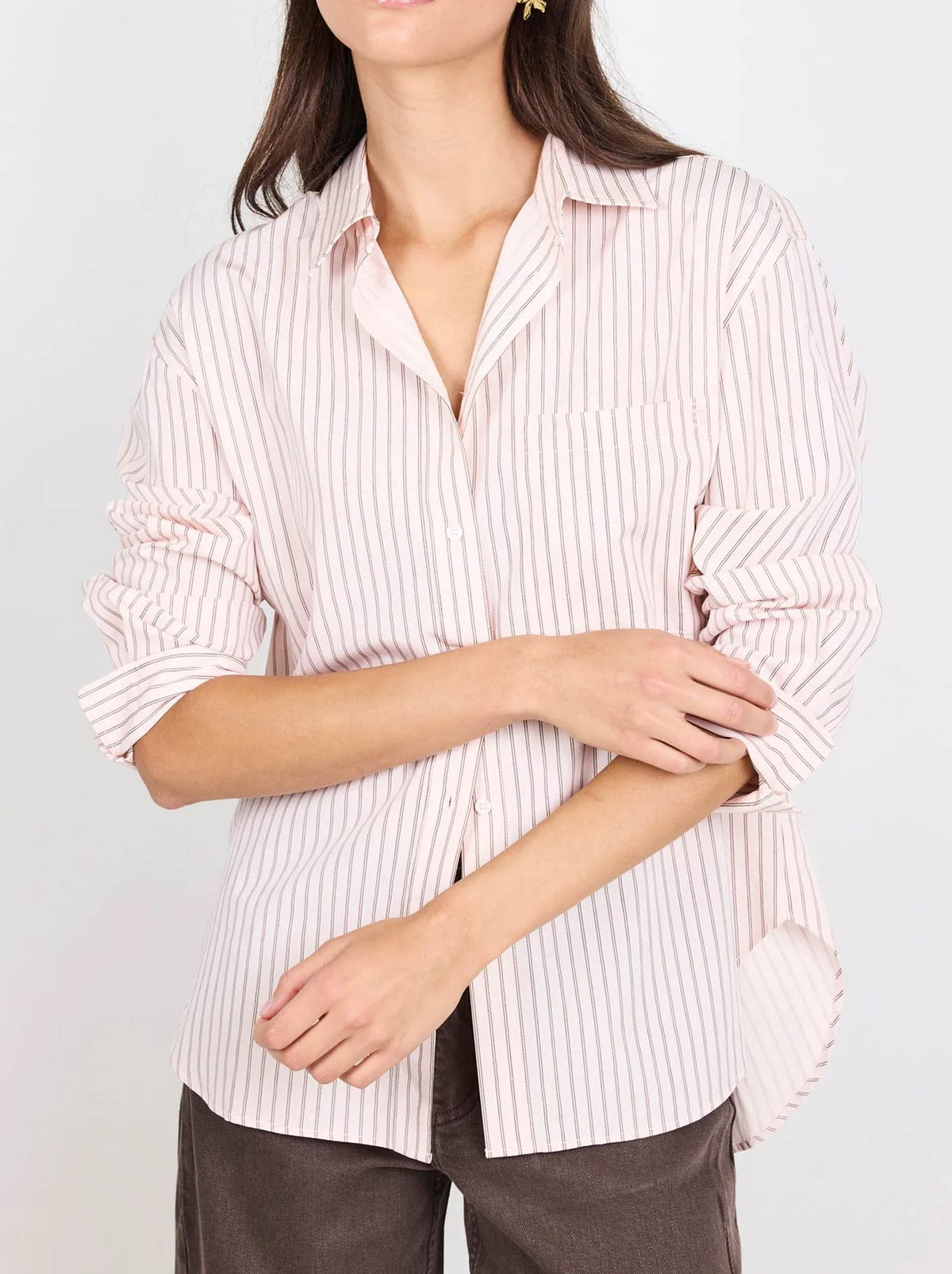 Image of a model wearing Tops. Product name - STORIES BE TOLD YOU GOT THIS STRIPE OVERSIZED SHIRT in Blush Stripe colour by brand - Stories Be Told
