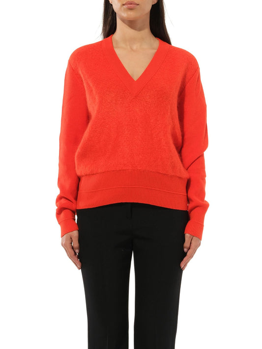 Image of a model wearing Outerwear. Productname: GIVENCHY Sweater Knit in Orange colour by brand - GIVENCHY
