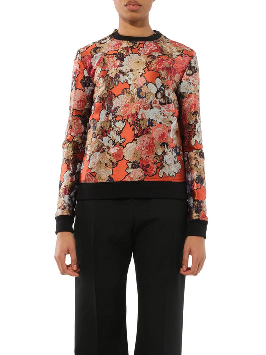 Image of a model wearing Outerwear. Productname: GIVENCHY Flower Sweatshirt in Orange Black colour by brand - GIVENCHY