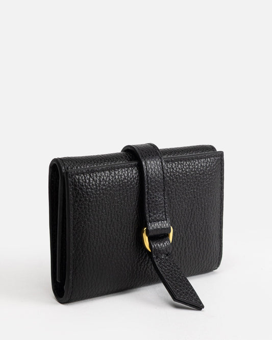 Image of Wallets & Money Clips. Productname: The Daily Edited Maia Trifold Snap Wallet Black in Black colour by brand - The Daily Edited
