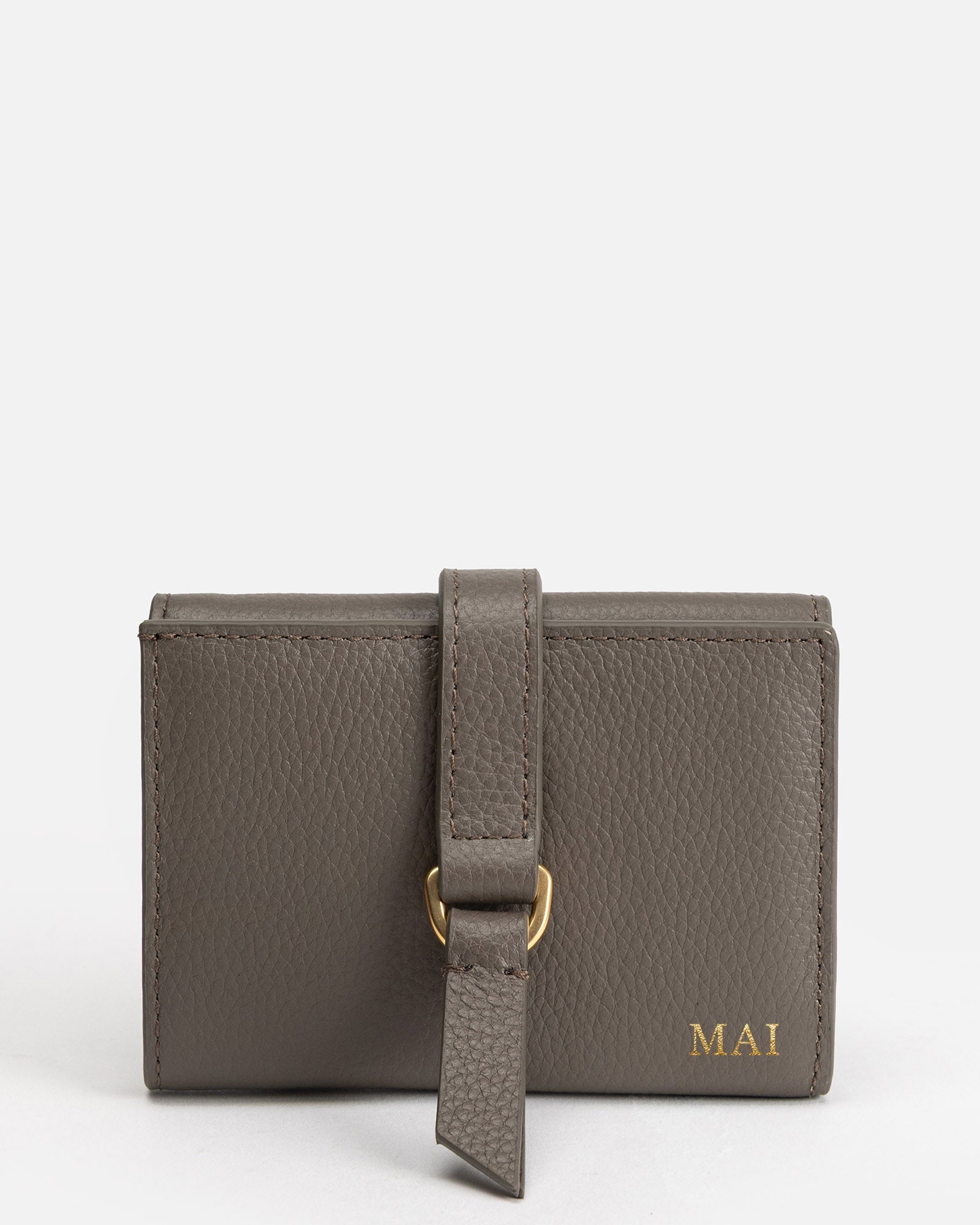 Image of Wallets & Money Clips. Productname: The Daily Edited Maia Trifold Snap Wallet Slate Grey in Grey colour by brand - The Daily Edited