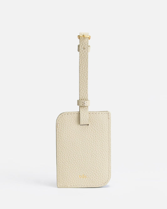 Image of Badge & Pass Holders. Productname: The Daily Edited Olivia Luggage Tag Oat in Oat colour by brand - The Daily Edited