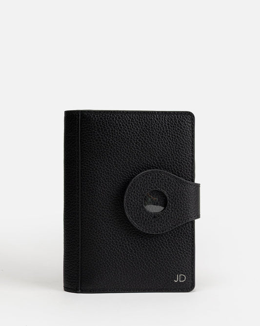 Image of Badge & Pass Holders. Productname: Jude Airtag Passport Holder Black in Black colour by brand - GROUP48