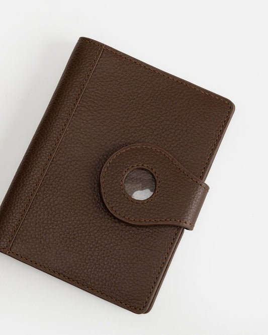 Image of Badge & Pass Holders. Productname: The Daily Edited Jude Airtag Passport Holder Chestnut in Chestnut colour by brand - The Daily Edited