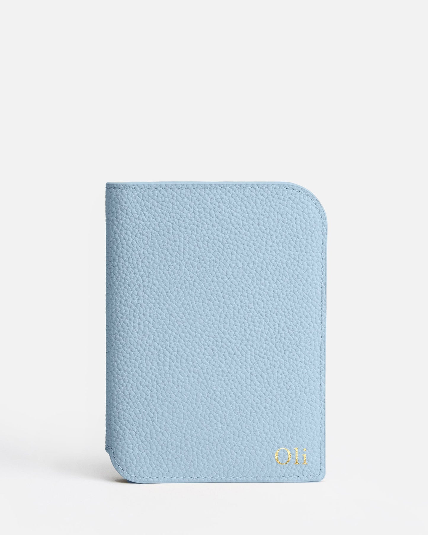 Image of Badge & Pass Holders. Product name - Olivia Passport Holder Baby Blue in Blue colour by brand - The Daily Edited