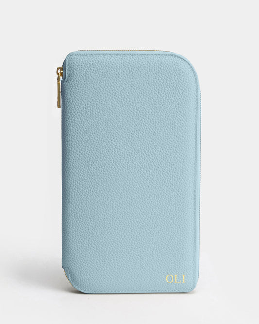 Image of Wallets & Money Clips. Product name - Olivia Family Travel Wallet Baby Blue in Blue colour by brand - The Daily Edited