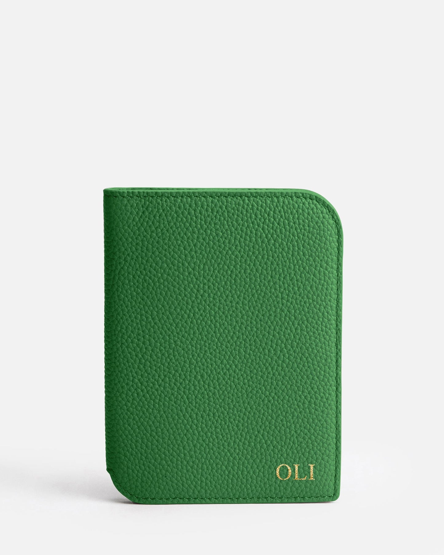 Image of Badge & Pass Holders. Product name - Olivia Passport Holder Emerald in Emerald colour by brand - The Daily Edited