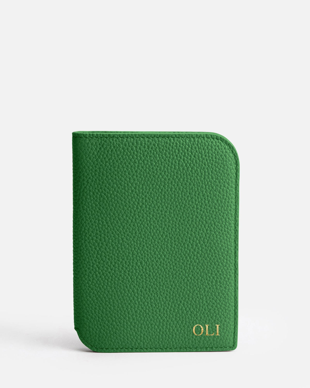 Image of Badge & Pass Holders. Product name - Olivia Passport Holder Emerald in Emerald colour by brand - The Daily Edited