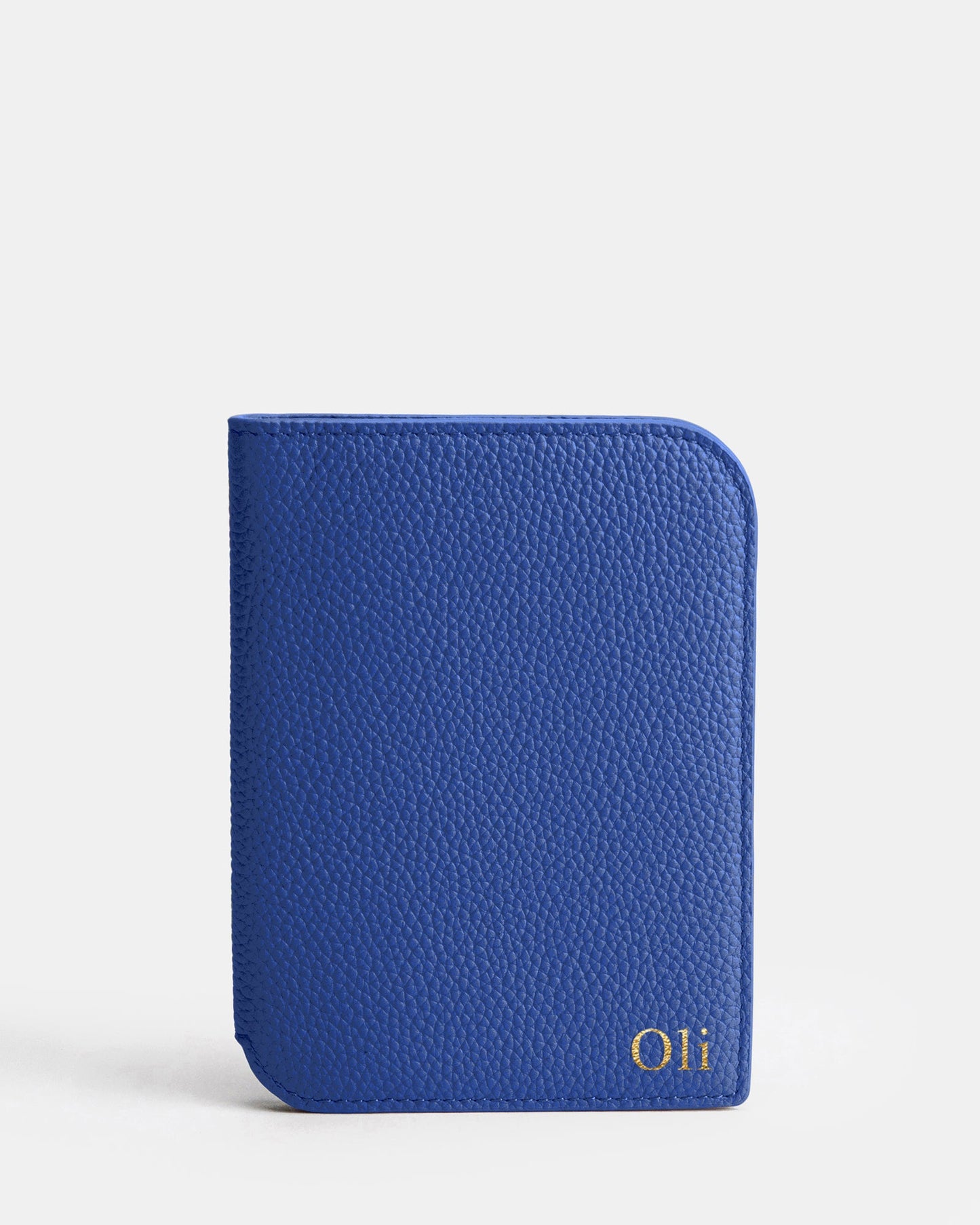 Image of Badge & Pass Holders. Product name - Olivia Passport Holder Ocean Blue in Blue colour by brand - The Daily Edited