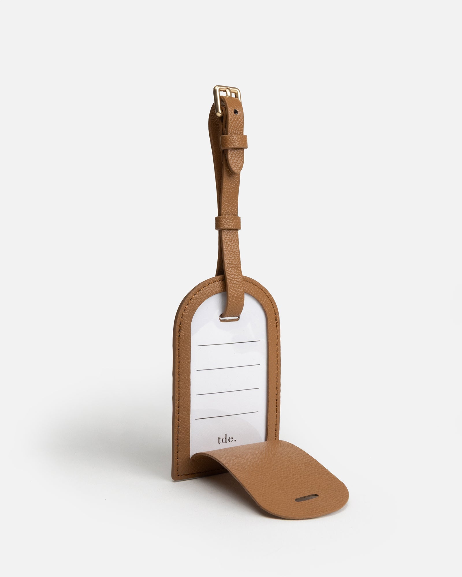 Image of Badge & Pass Holders. Product name - Essentials Square Luggage Tag Tan in Tan colour by brand - The Daily Edited