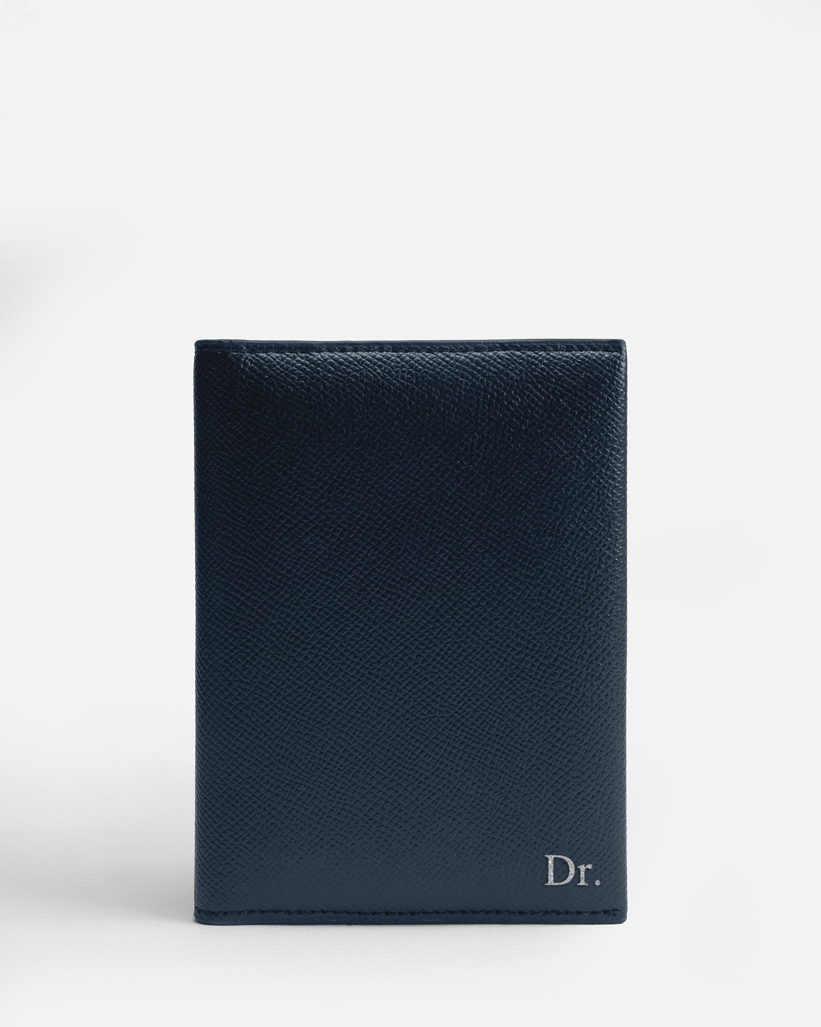 Image of Badge & Pass Holders. Product name - Essentials Passport Sleeve Navy in Navy colour by brand - The Daily Edited
