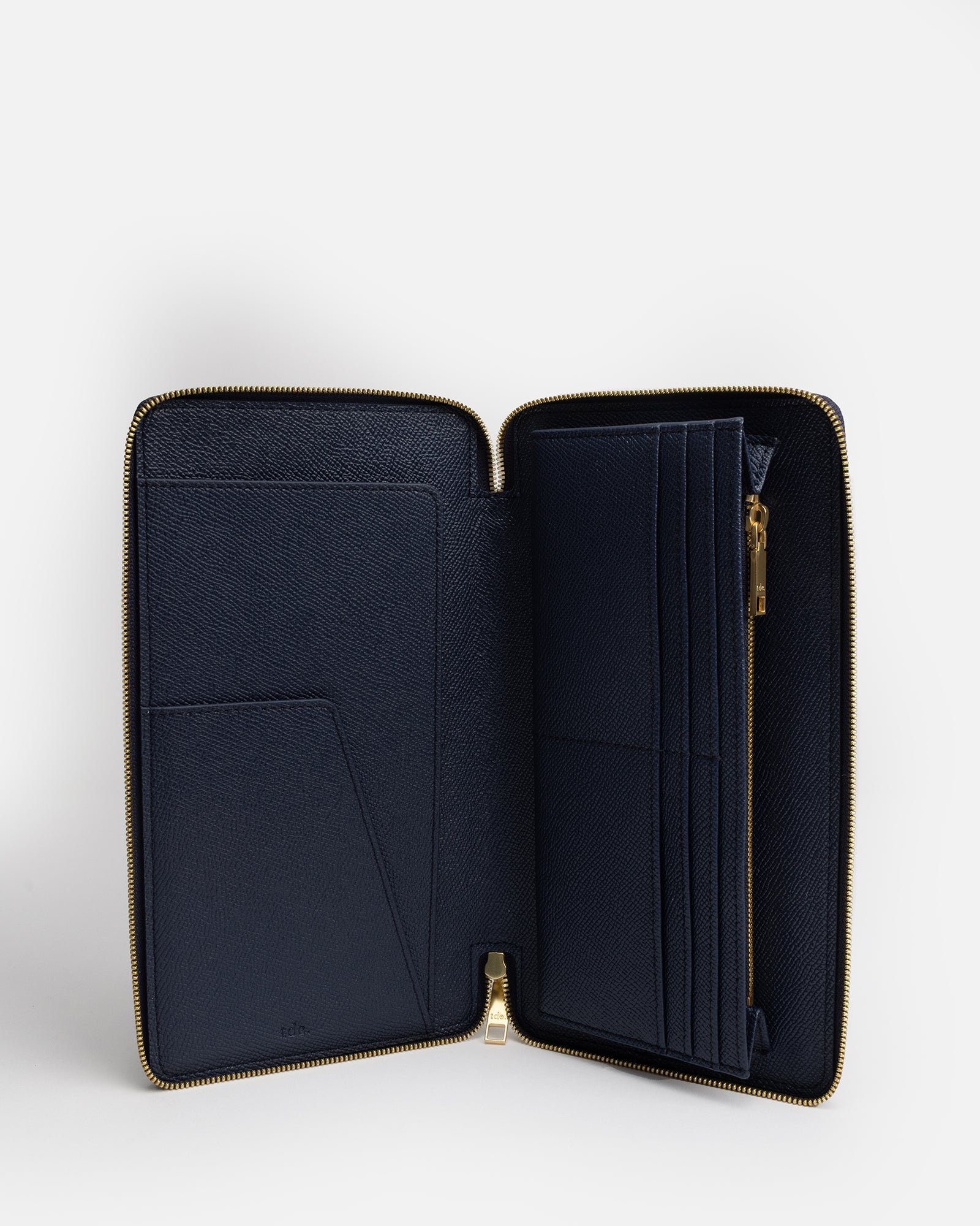 Image of Wallets & Money Clips. Product name - Essentials Zip Travel Wallet Navy in Navy colour by brand - The Daily Edited