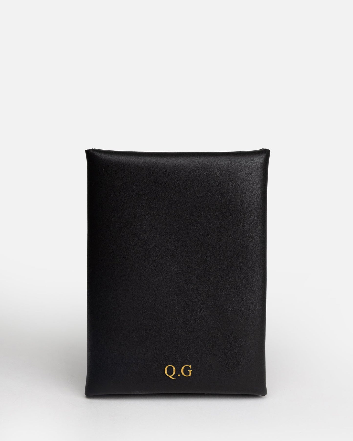 Image of Badge & Pass Holders. Product name - Remy Passport Sleeve Black in Black colour by brand - The Daily Edited