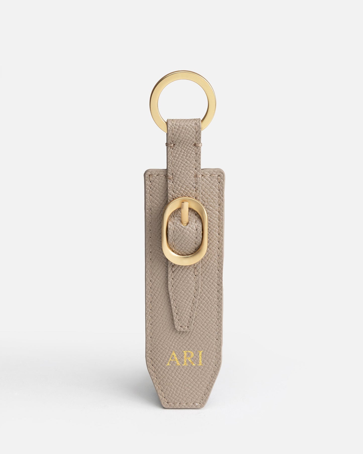 Image of Keychains. Product name - Aria Keyring Sepia in Sepia colour by brand - The Daily Edited