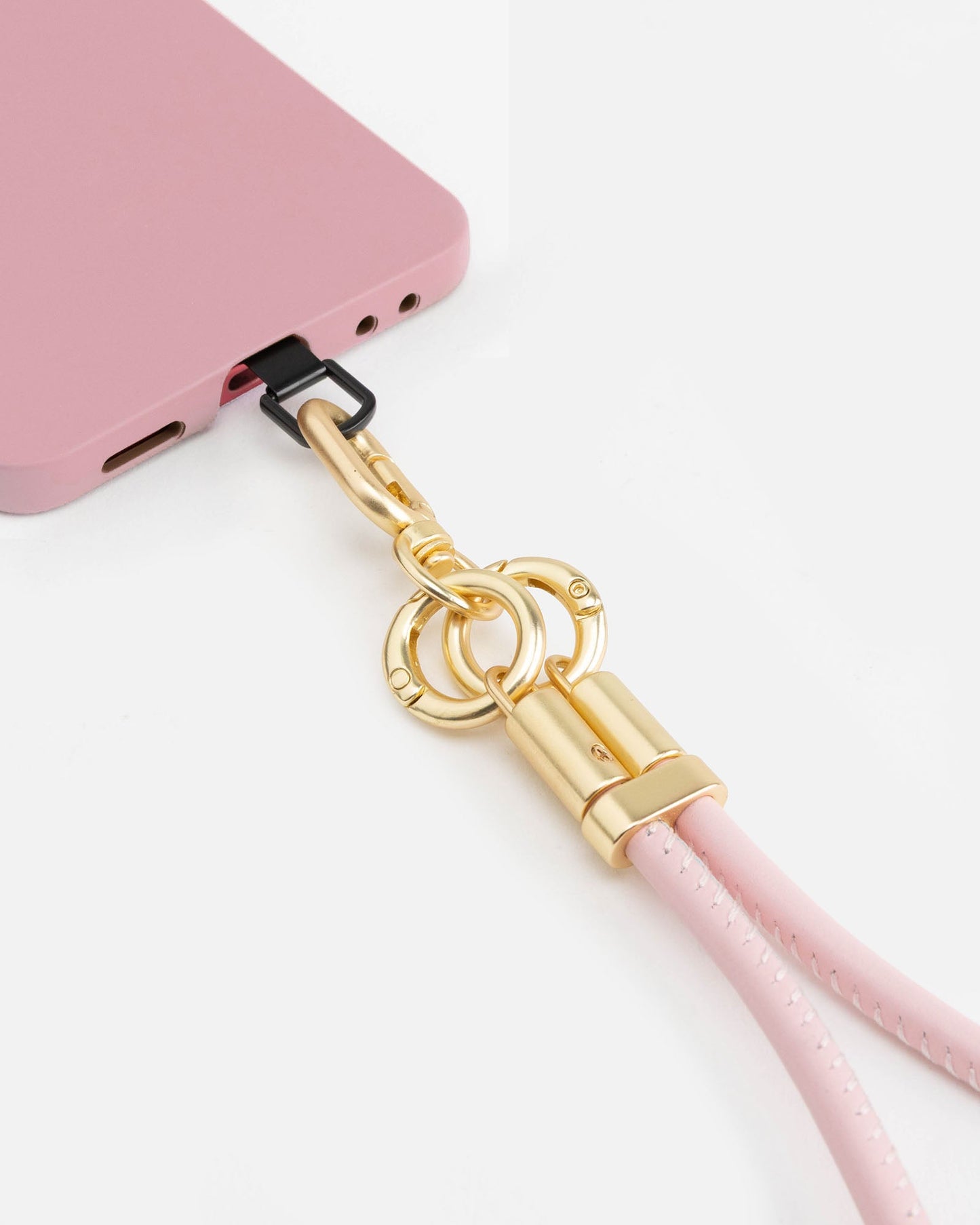 Image of Accessories. Product name - Phone Wristlet Pink in Pink colour by brand - The Daily Edited