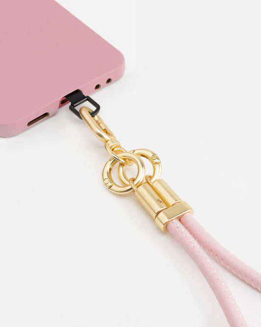 Image of Accessories. Product name - Phone Wristlet Pink in Pink colour by brand - The Daily Edited
