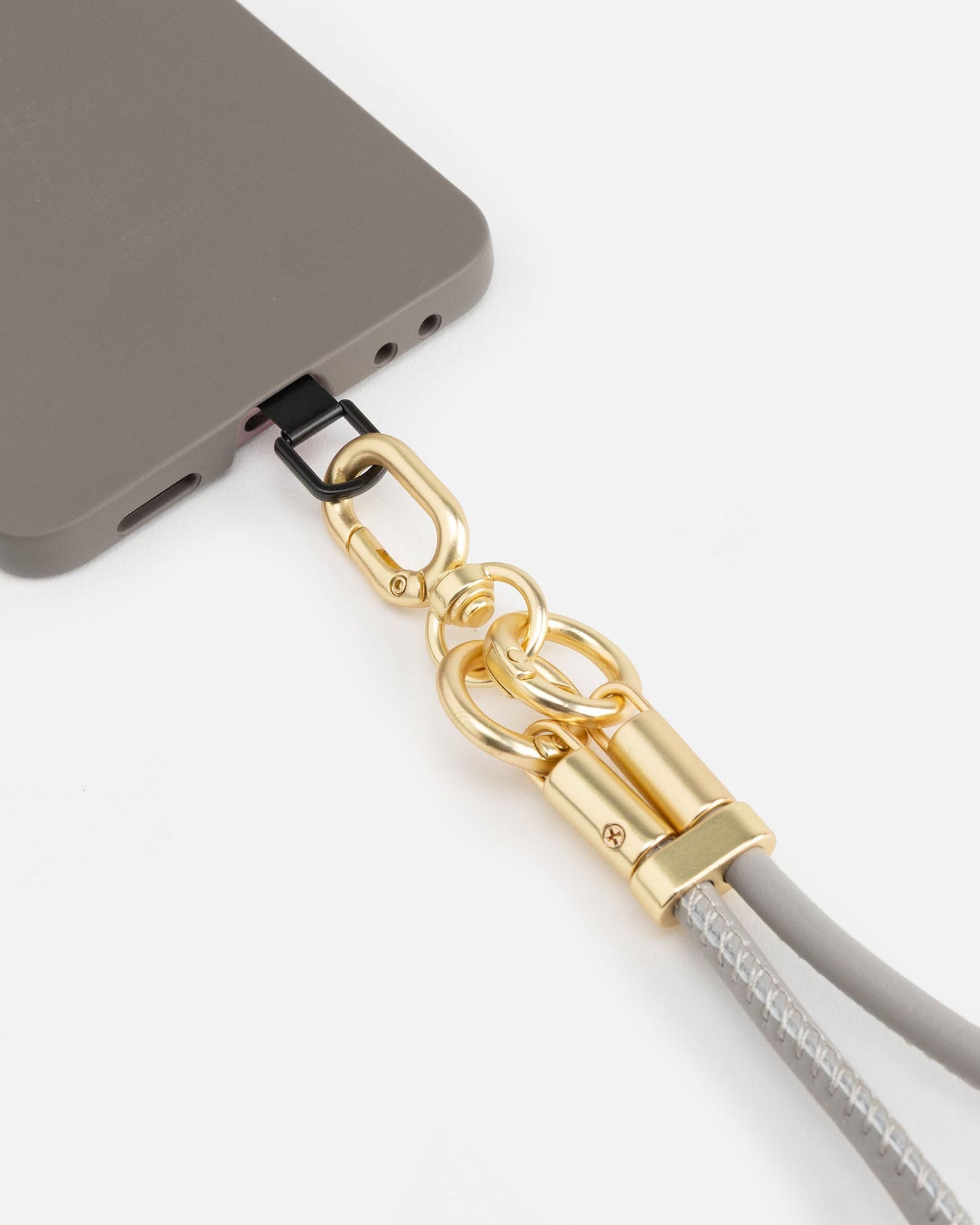 Image of Accessories. Product name - Phone Wristlet Grey in Grey colour by brand - The Daily Edited