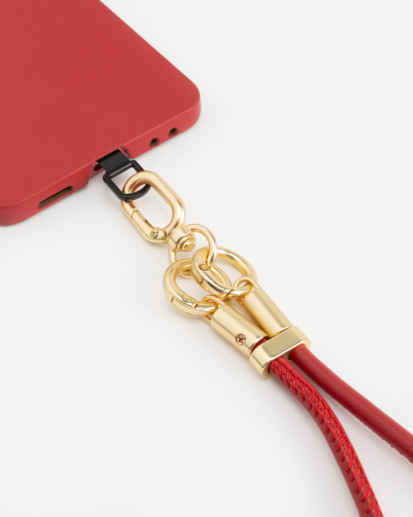 Image of Accessories. Product name - Phone Wristlet Red in Red colour by brand - The Daily Edited