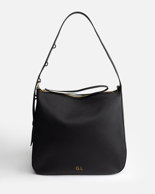 Image of Bags. Product name - Olivia Large Hobo Black in Black colour by brand - The Daily Edited