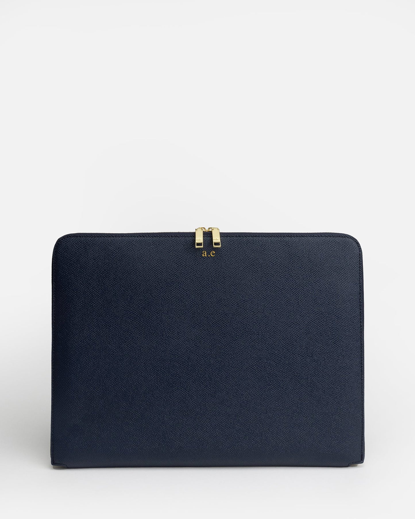 Image of Electronics Accessories. Product name - Essentials 13" Laptop Cover Navy in Navy colour by brand - The Daily Edited