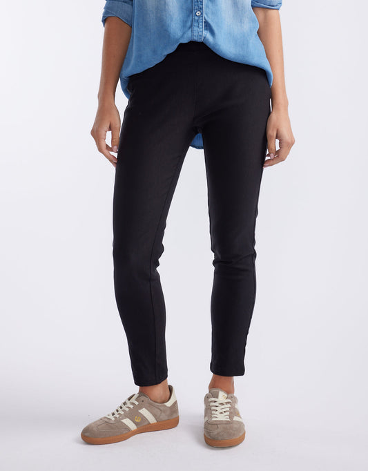 Image of a model wearing Pants. Productname: The 24/7 Bengaline Crop Pant - in Black colour by brand - Tirelli