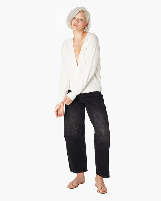 Image of a model wearing Outerwear. Productname: Cashmere V Neck Cardigan Cream in Cream colour by brand - TKEES